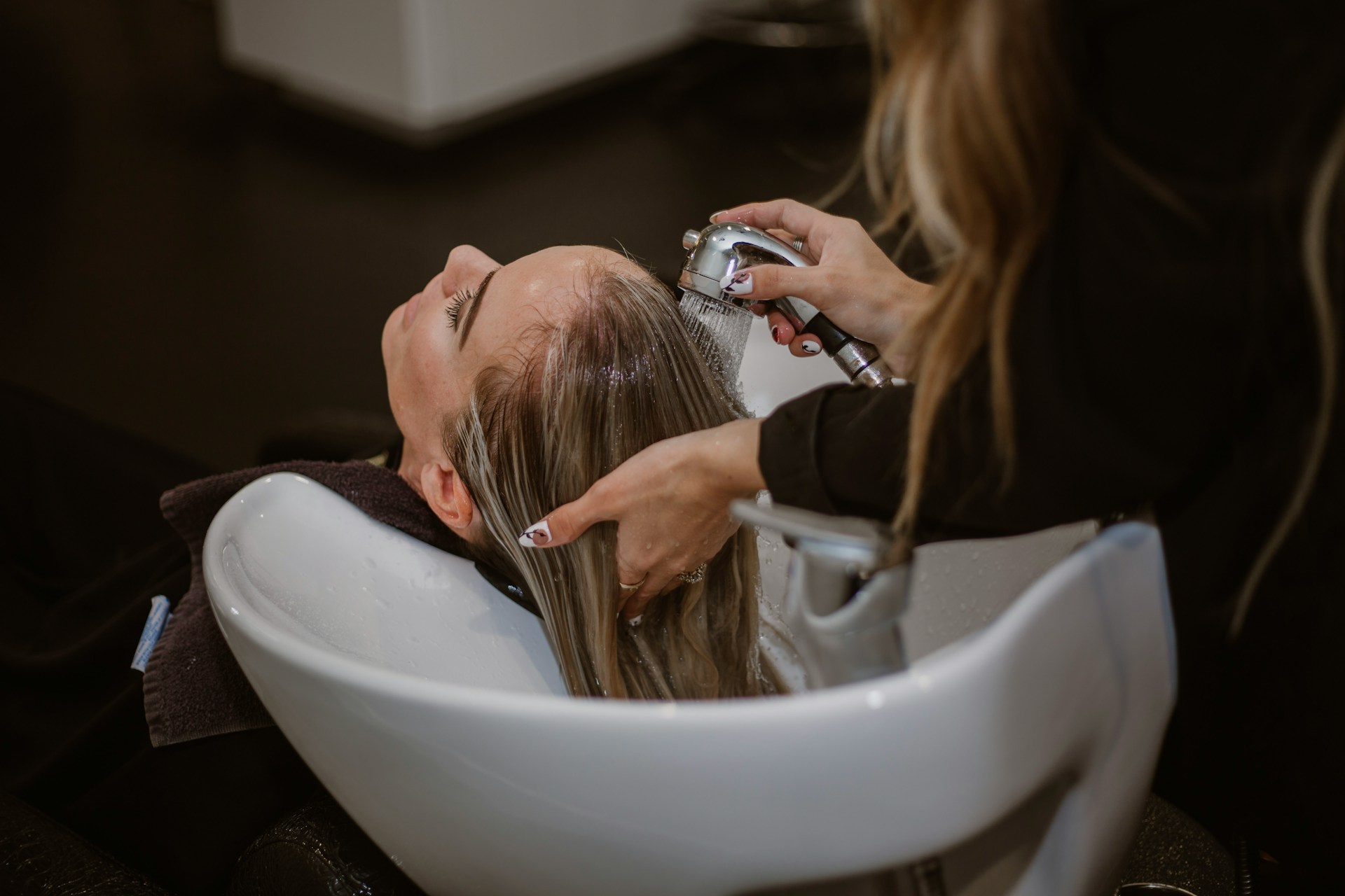 Having Hair Washed at Hairdressers