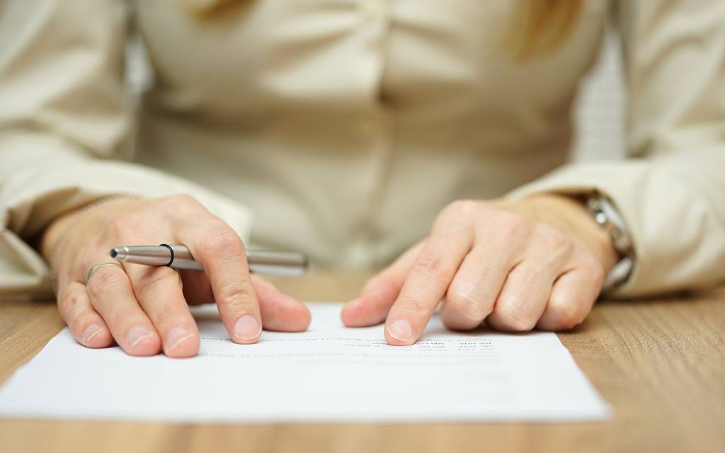 Person Reading Contract